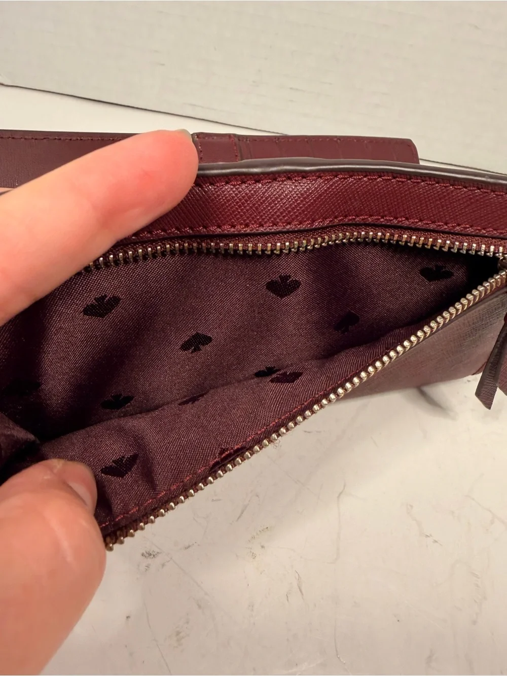 Kate Spade Cameron Large Slim Bifold Wallet in Burgundy Saffiano Leather